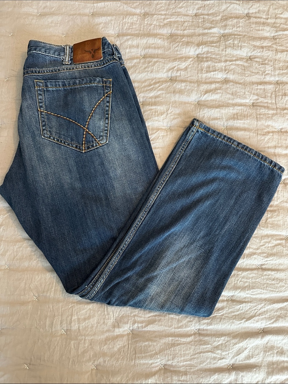 36x30 Wrangler Men's Blue Bootcut Jeans with Leather Patch